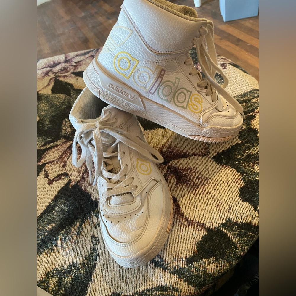 These ADIDAS shoes are size 5 woman’s. They are in really good used condition